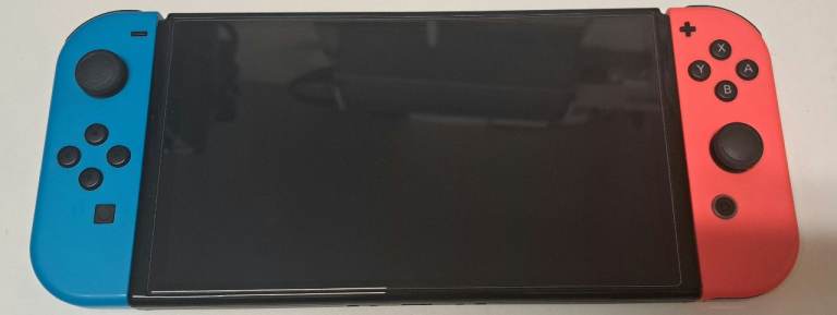 Nintendo Switch OLED Neon + Mario Kart 8 Deluxe Bundle