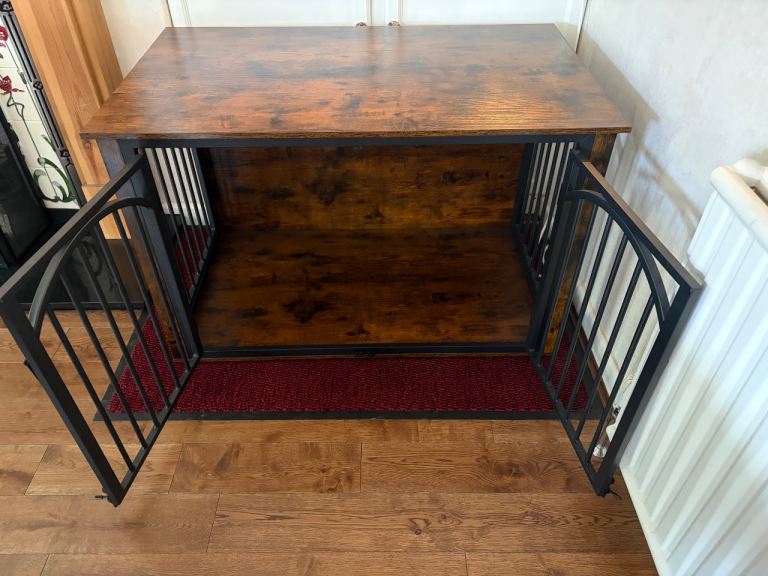 Beautiful rustic dog crate, perfect condition as our dog would not entertain it!