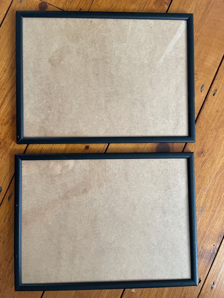 Two Black Picture Frames with Glass – Good Condition
