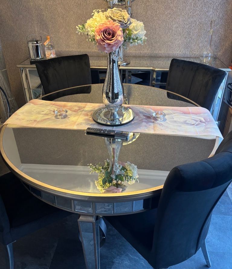 Mirror dining table and 4 black velvet chairs 