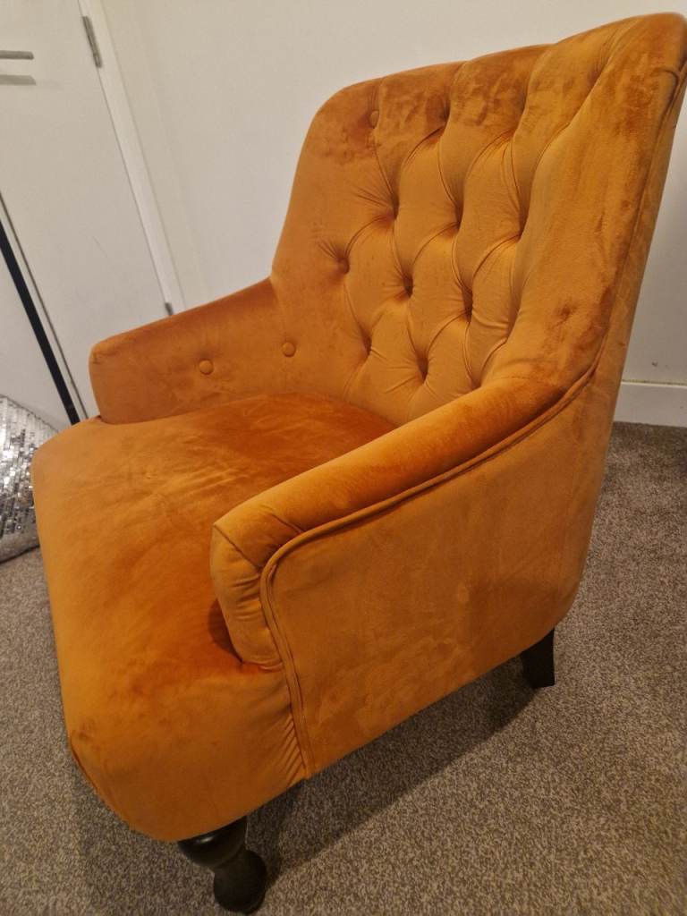 Burnt orange arm chair £80