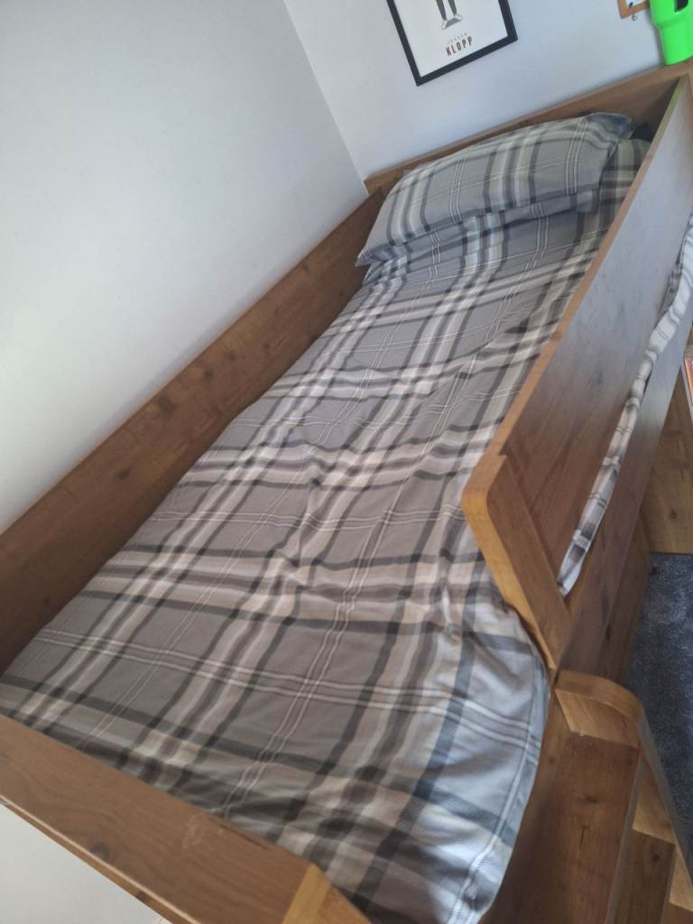 Single bunk bed with built in storsge