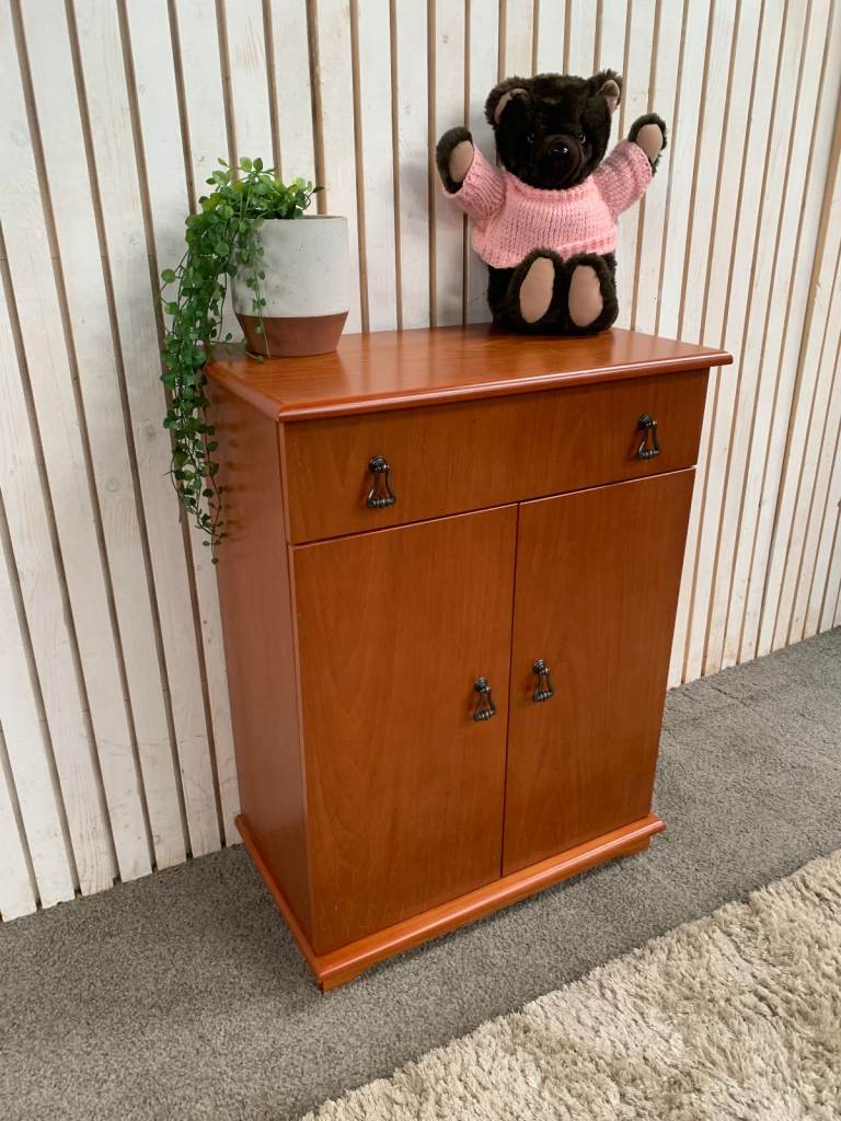 Cupboard with 1 Drawer and 2 Doors Brown wood .