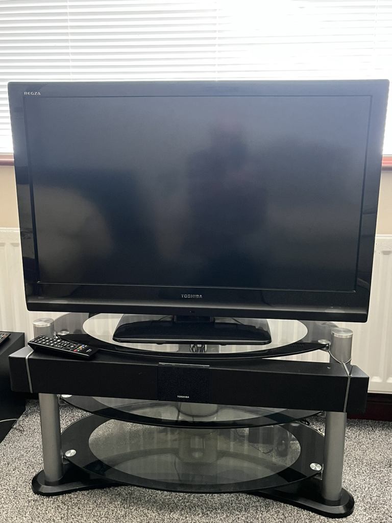 Toshiba 38 Inch Tv with Soundbar and TV stand