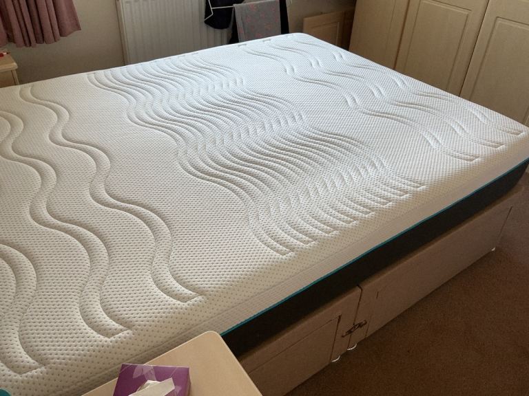 King size bed complete with mattress and headboard, excellent condition £550