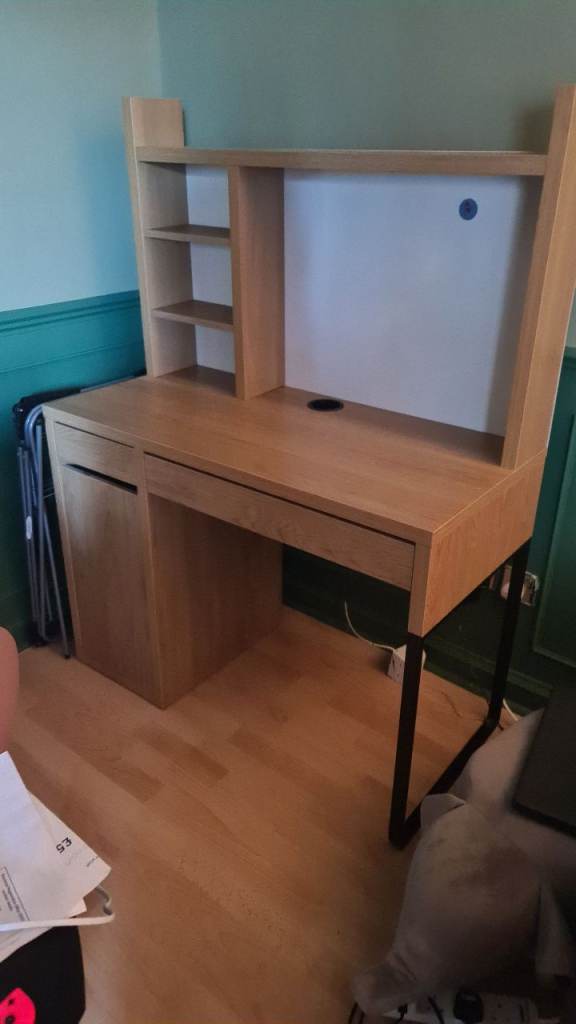 Desk with storage locker