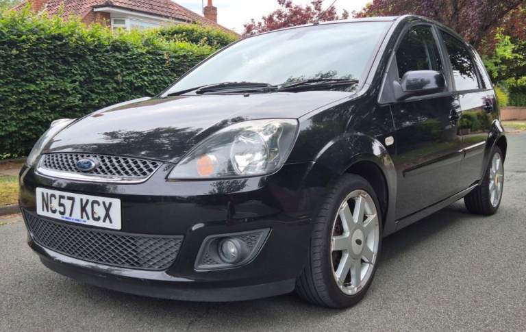 Black. A Low mileage Ford Fiesta Zetec Climate. 2008. 1.25. 5 door. Manual. Petrol. Well cared for.