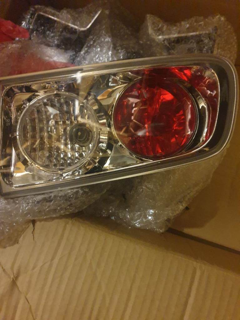 Renault laguna 2006 rear lights brand new