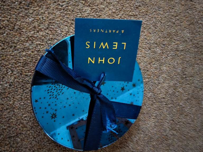 New John Lewis set of 4 blue coasters. 