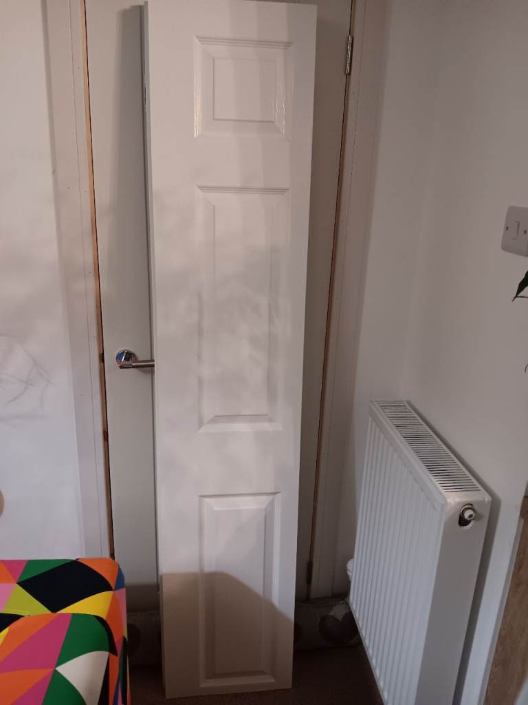 New Howdens white folding door 