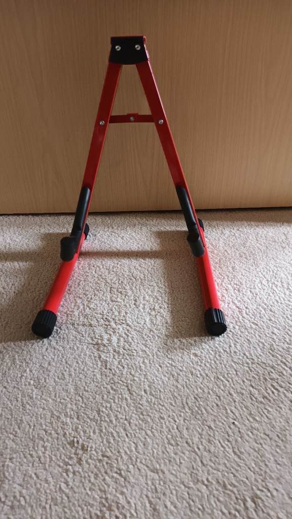 guitar stand for sale in black or red