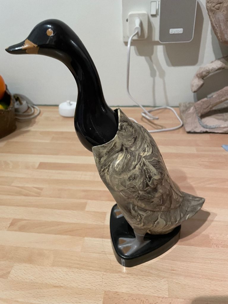 Vintage Bakelite duck clothes brush 