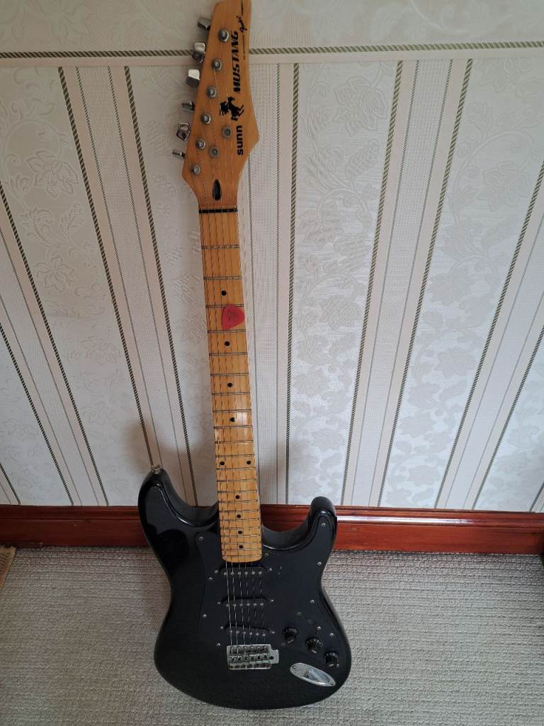 Sunn Mustang electric Guitar with Kustom electric guitar amplifier