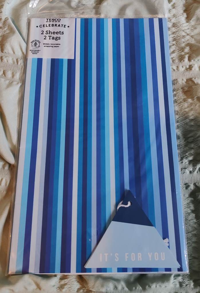 New wrapping paper sets Includes 2 sheets 2 tags