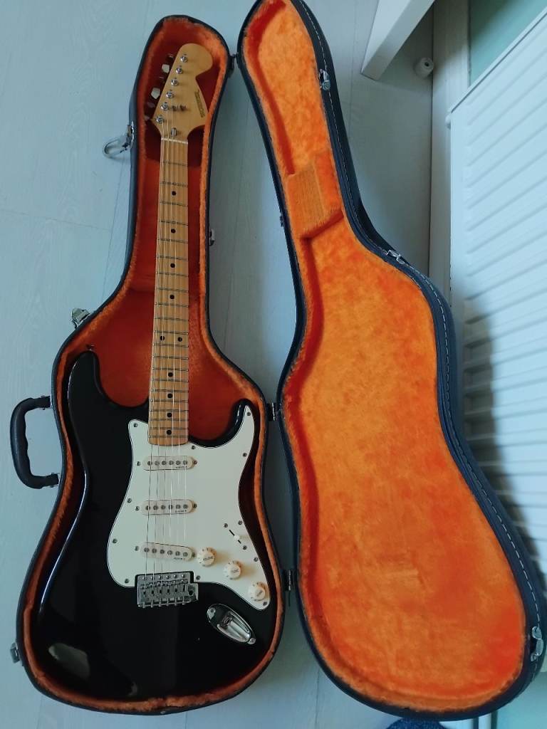 Japanese Stratocaster style guitar 1970s MIJ Strat by Hohner Japan black large headstock case setup