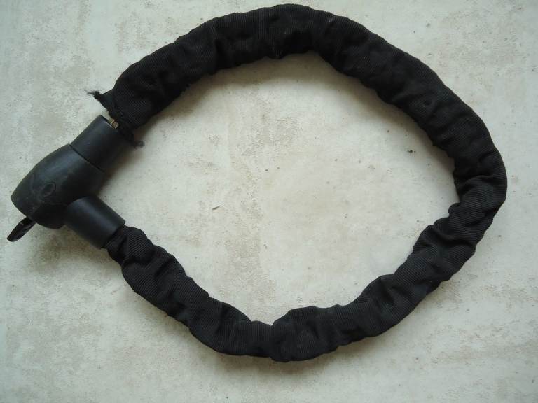 Motorcycle security bike chain with integrated lock