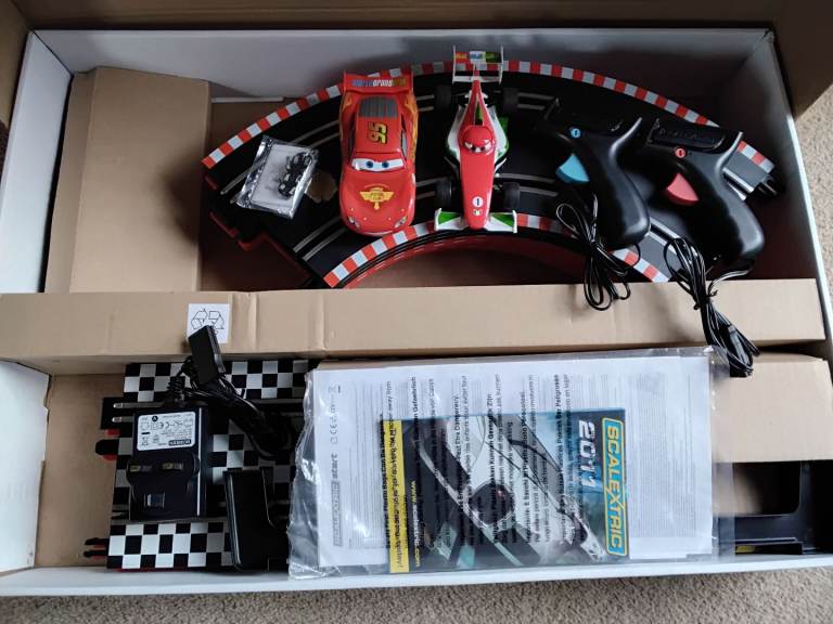 Scalextric - Disney Pixar Cars 2. 1:32 scale slot racing, World Grand Prix.