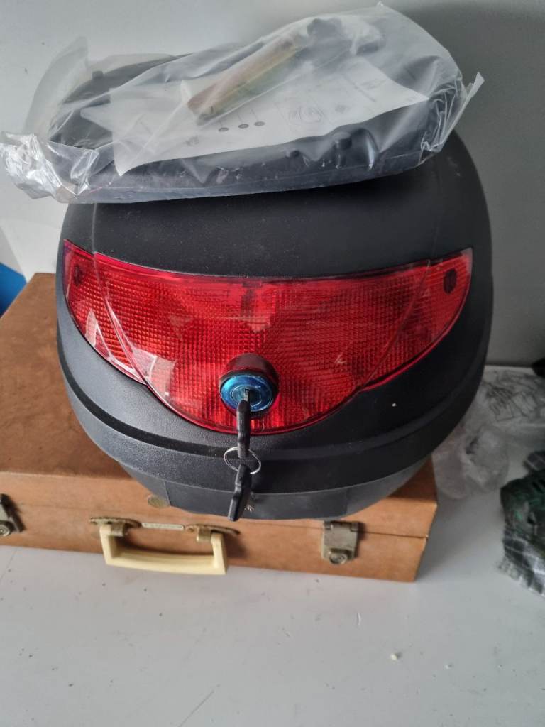 Scooter back box helmet storage