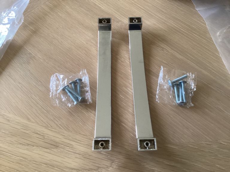 Kitchen cupboard handles.