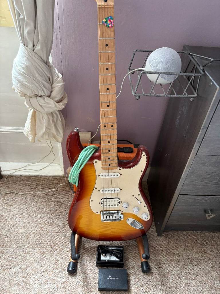 Electric Guitar with Stand and Accessories – Good Condition