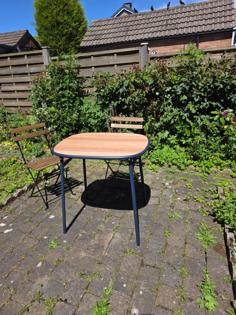 IKEA outdoor table with two chairs in excellent condition 
