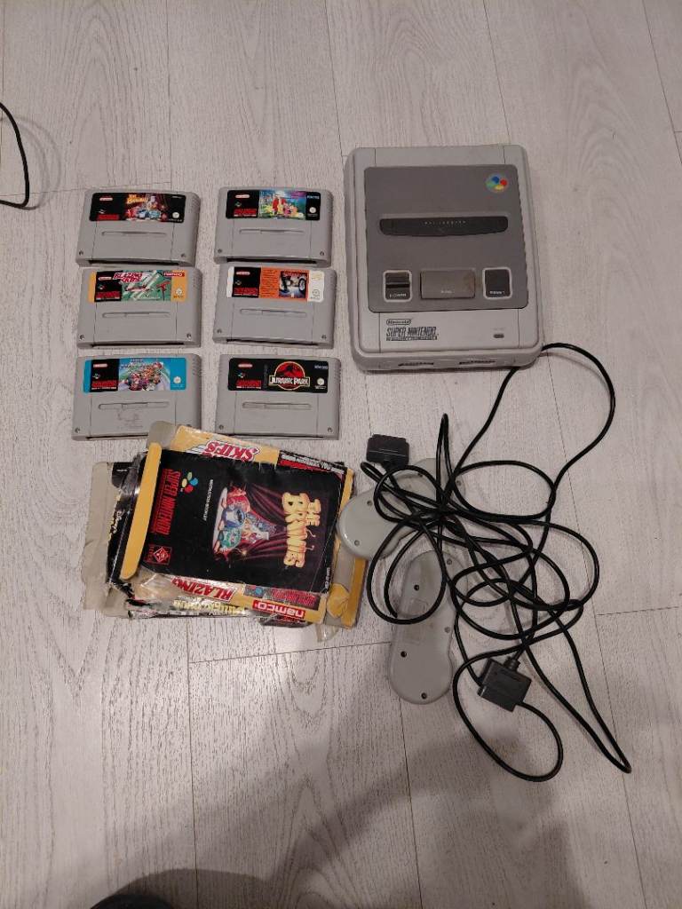 image for Retro snes console,  controllers and games bundle 