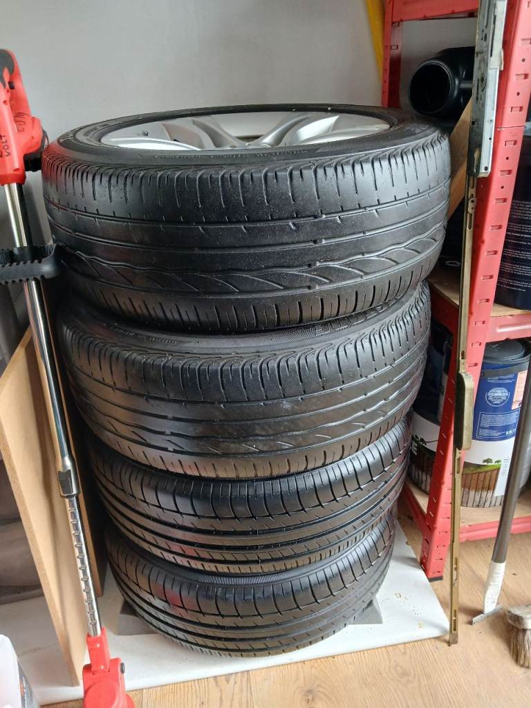 Alloy wheels and next to new tyres