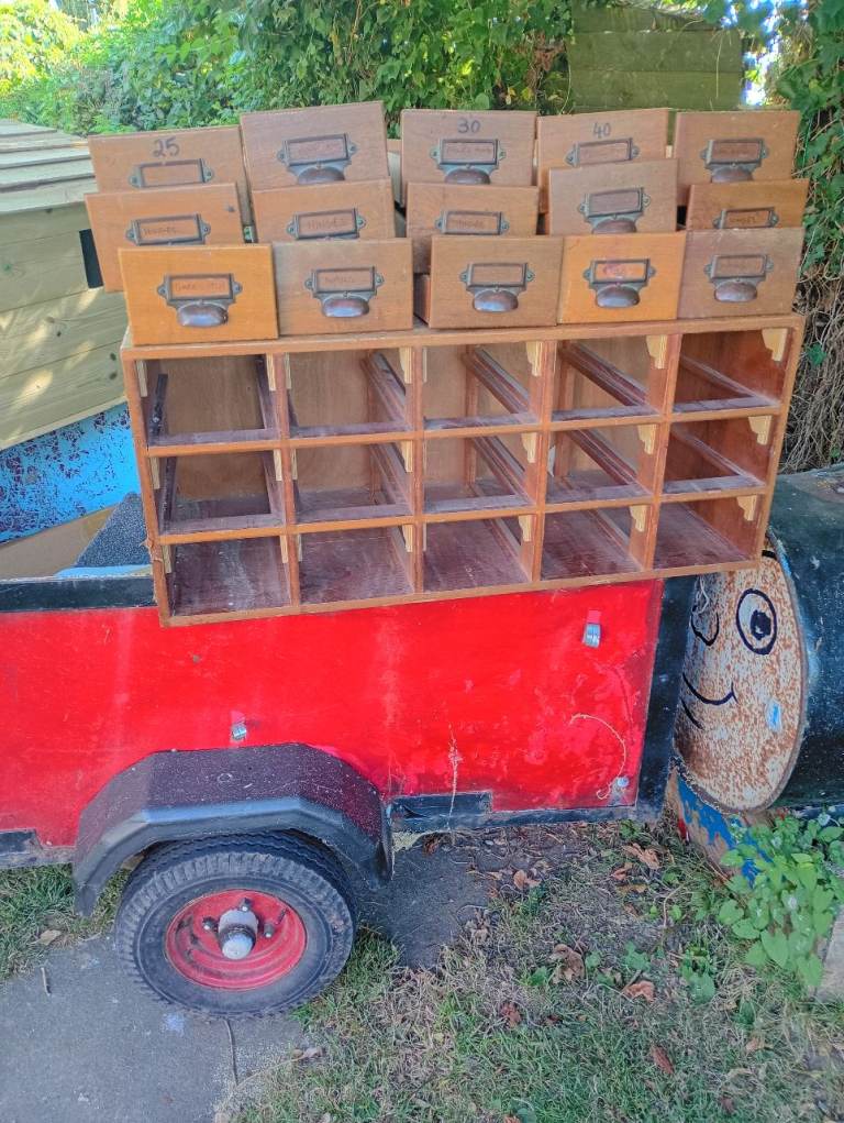 Vintage Wooden Multi-Drawer Storage Unit with Smaller Drawers