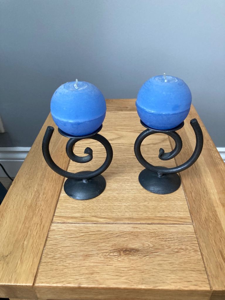 Candlestick holders with candles