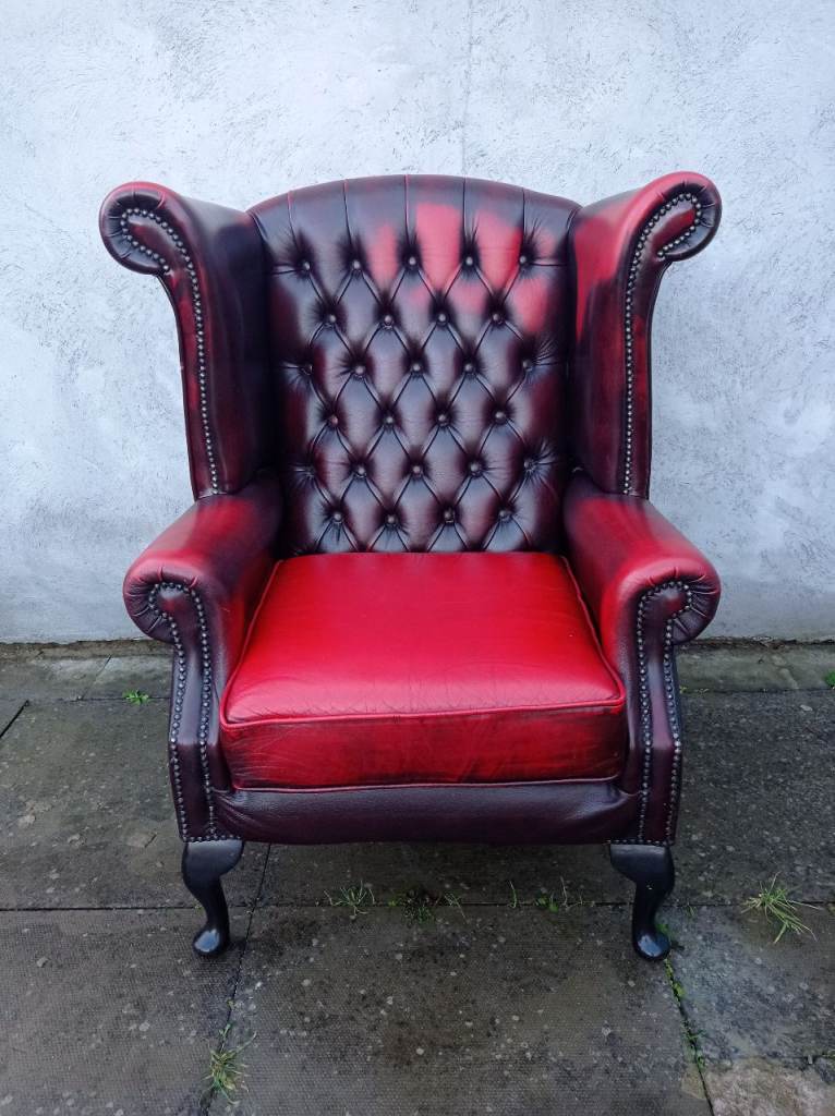 A Red Leather Chesterfield Queen Ann/Wing ArmChair