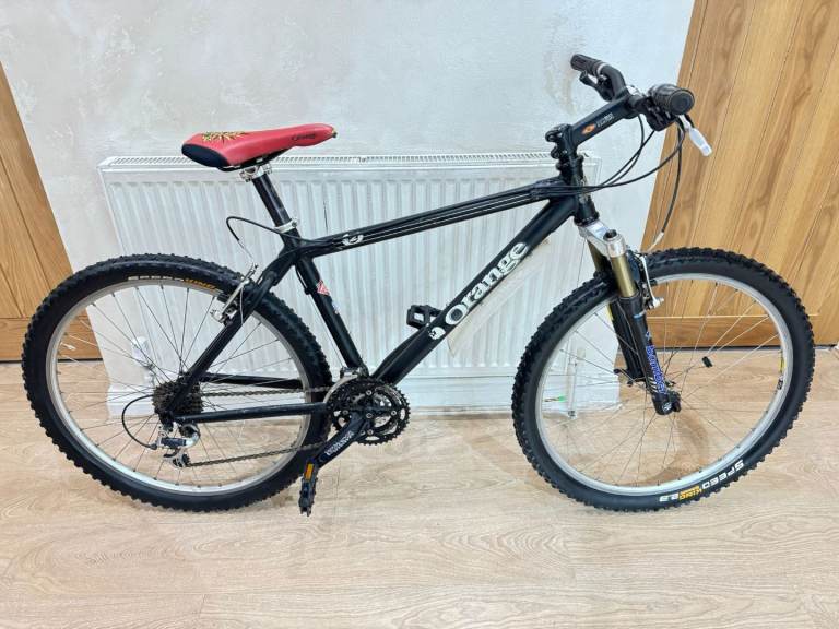 Orange 2 mountain bike in good condition All fully working 