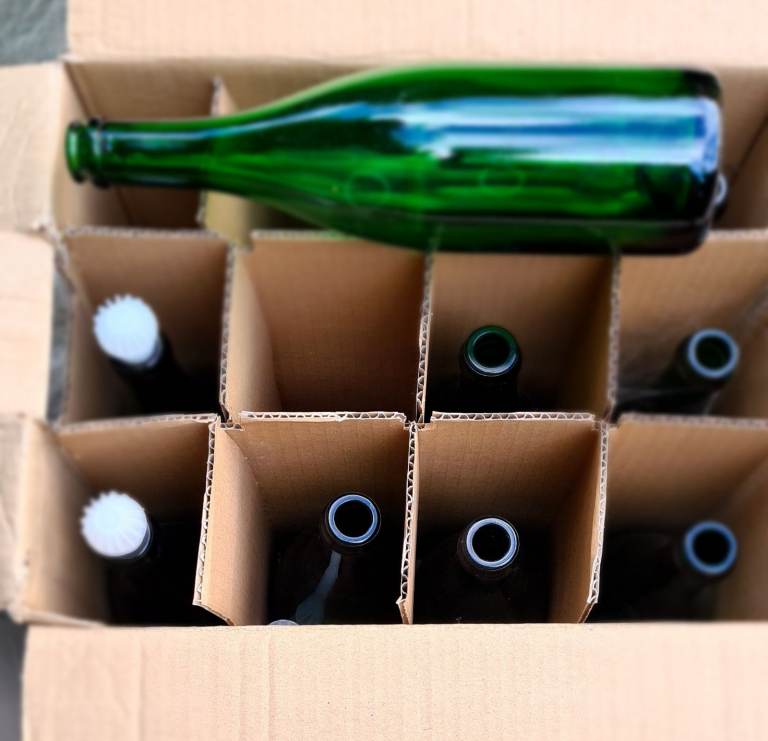 Home brewing items -  new/empty green champagne bottles
