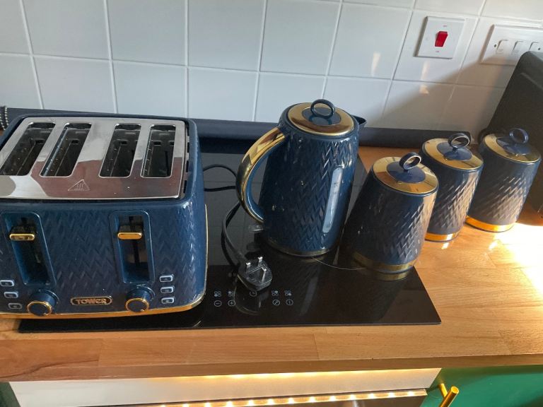 Kettle toaster tea coffee and sugar canisters 