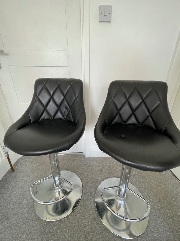 Two Black Faux Leather Adjustable Bar Stools