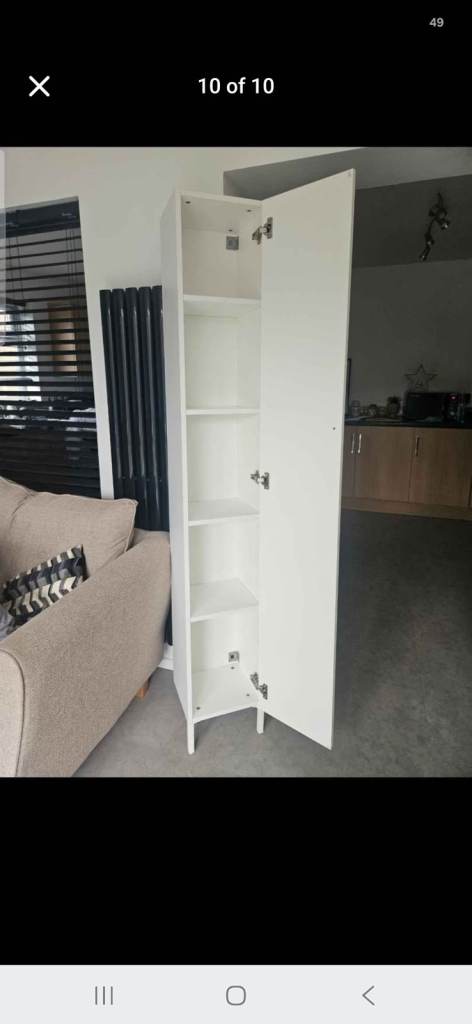White Tall Storage Cabinet with Shelves – Good Condition