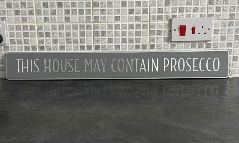 Next - ‘ This House May Contain Prosecco’ bar sign