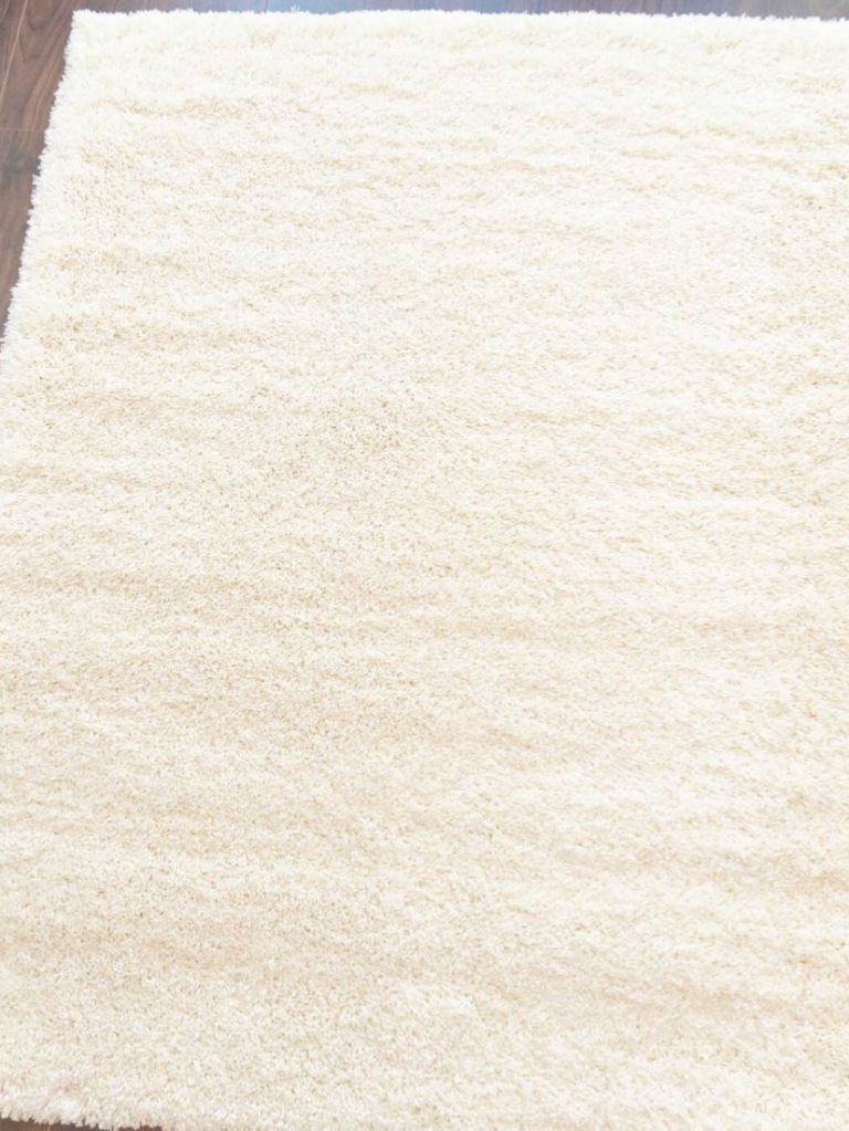 Cream shaggy pile rug soft and cosy