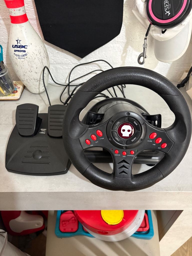 Gaming steering wheel and pedals for all platforms. Xbox. PC. PlayStation.