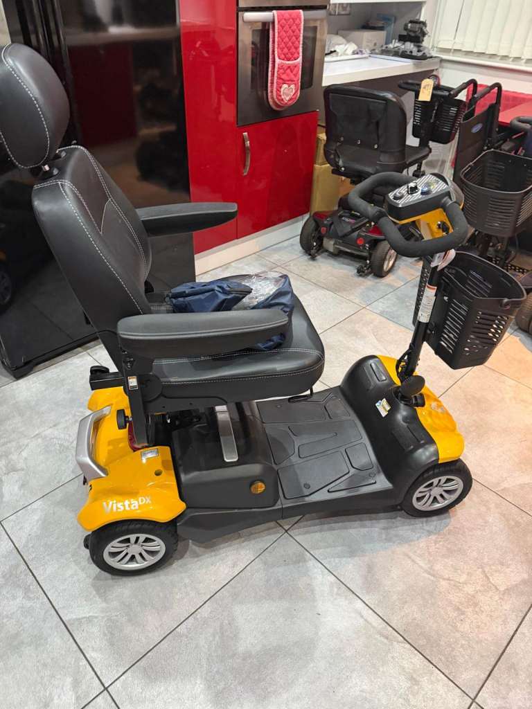 BRAN NEW - RASCAL VISTA DX SCOOTER - ORANGE - 12 MONTHS WARRANTY