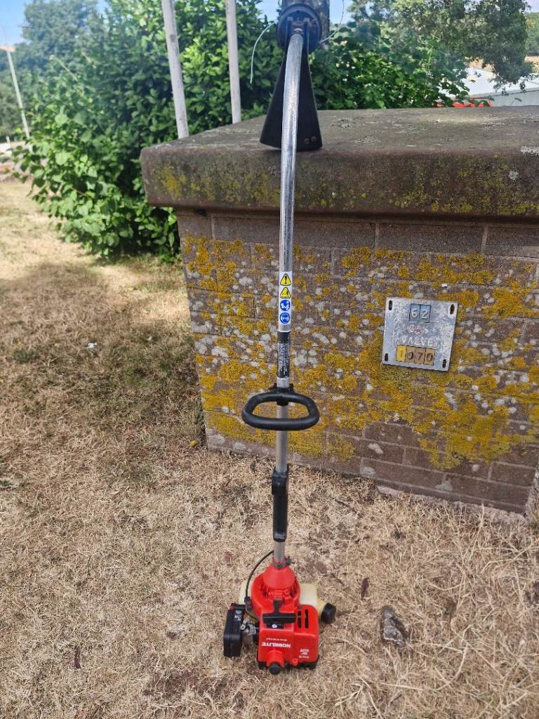 HOMELITE Petrol Strimmer - Good Condition, Ready for Use