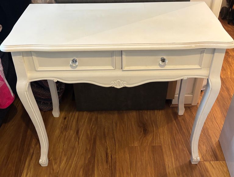 white console/dressing table with two drawers and crystal-style knobs.