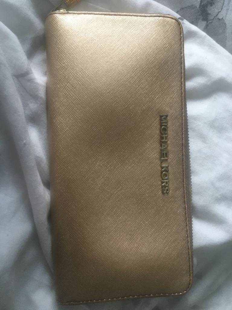 Gold Michael Kors purse/wallet