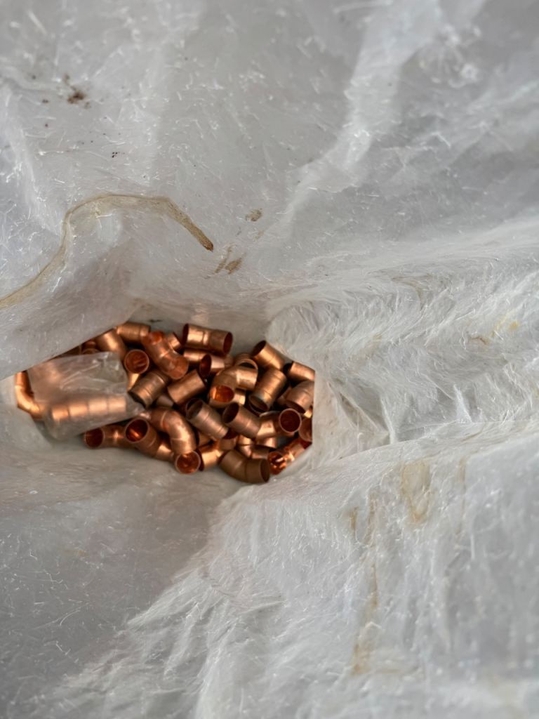 35 mm pipe and bag of 35 mm copper solder fittings