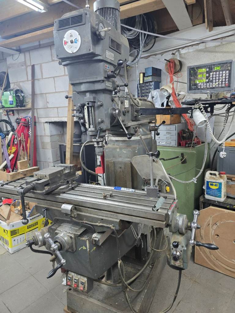 Turret milling machine 40 International 3 phase with three axis digital read out .Like Bridgeport 