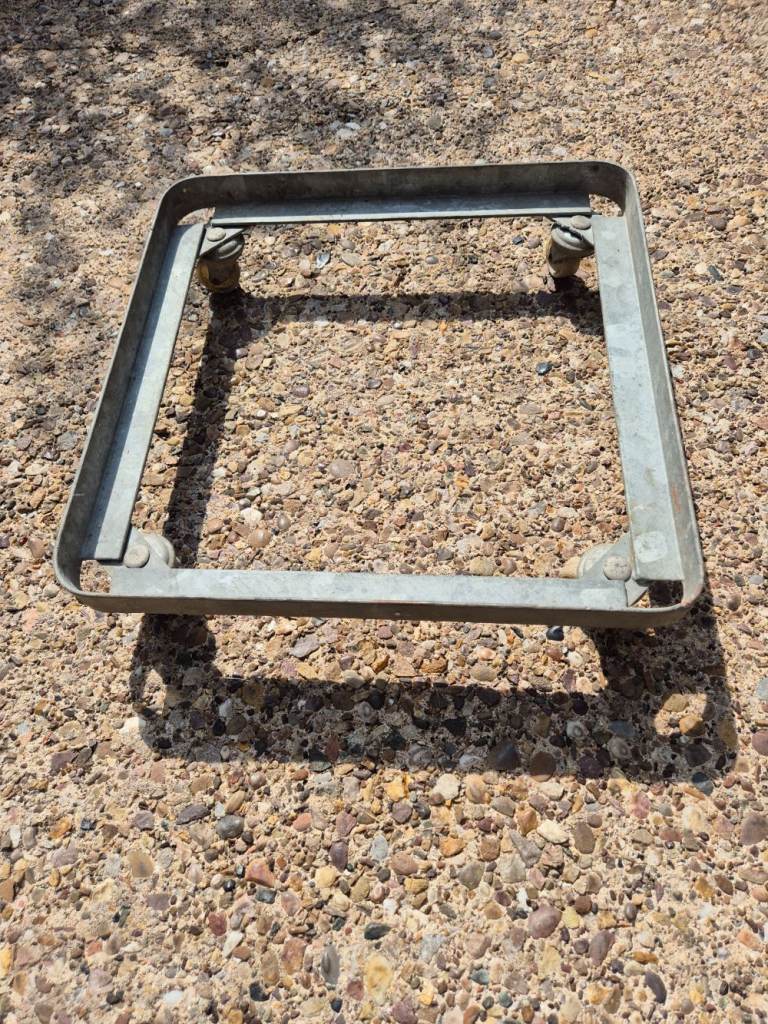 Strong metal frame with casters on - external dimensions are 42cm x 42cm x 9.5cm