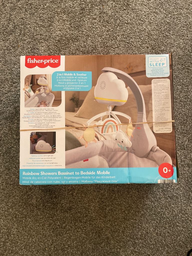 The Fisher-Price Rainbow Showers Bassinet to Bedside Mobile