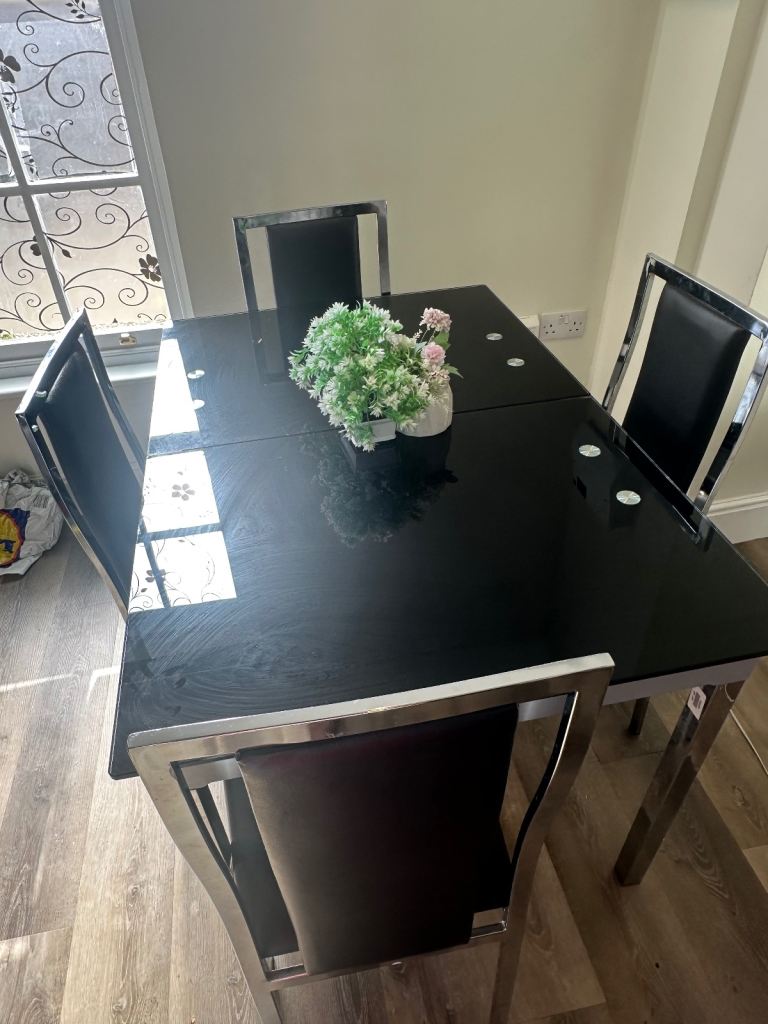 Black Glass Dining Table with 4 Chairs in Kings Lynn Nofolk- Chrome Frame