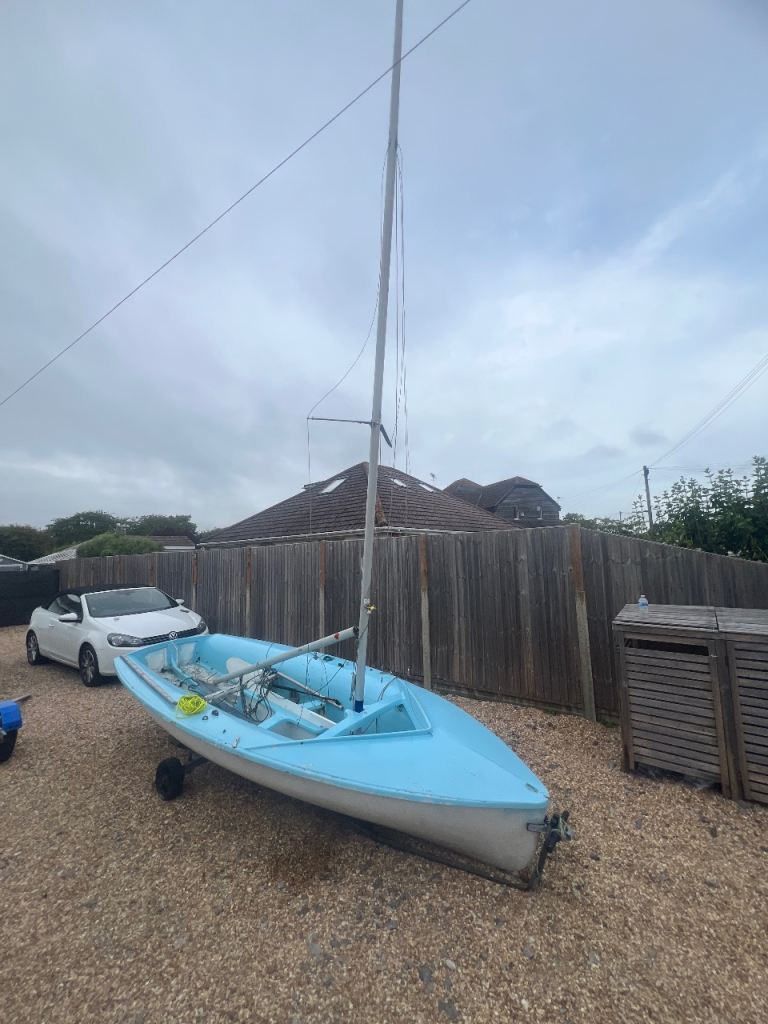 Dinghy Sailing Boat with Mast, Boom, sails and launch trailer