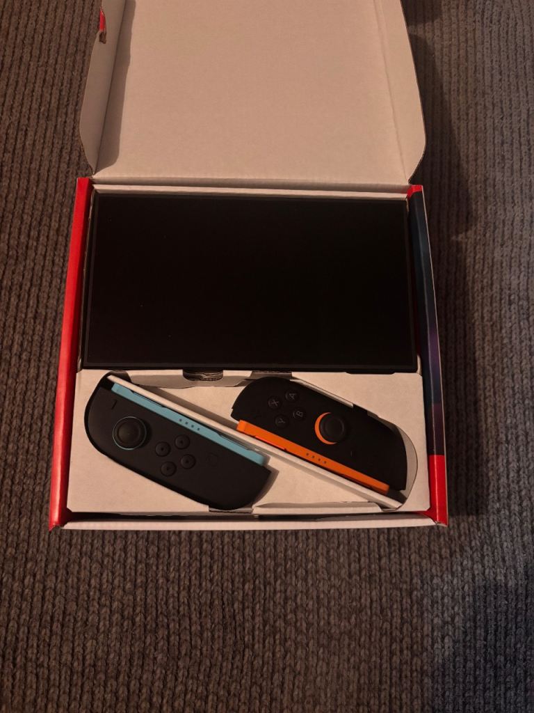 Nintendo Switch 2 in box with accessories