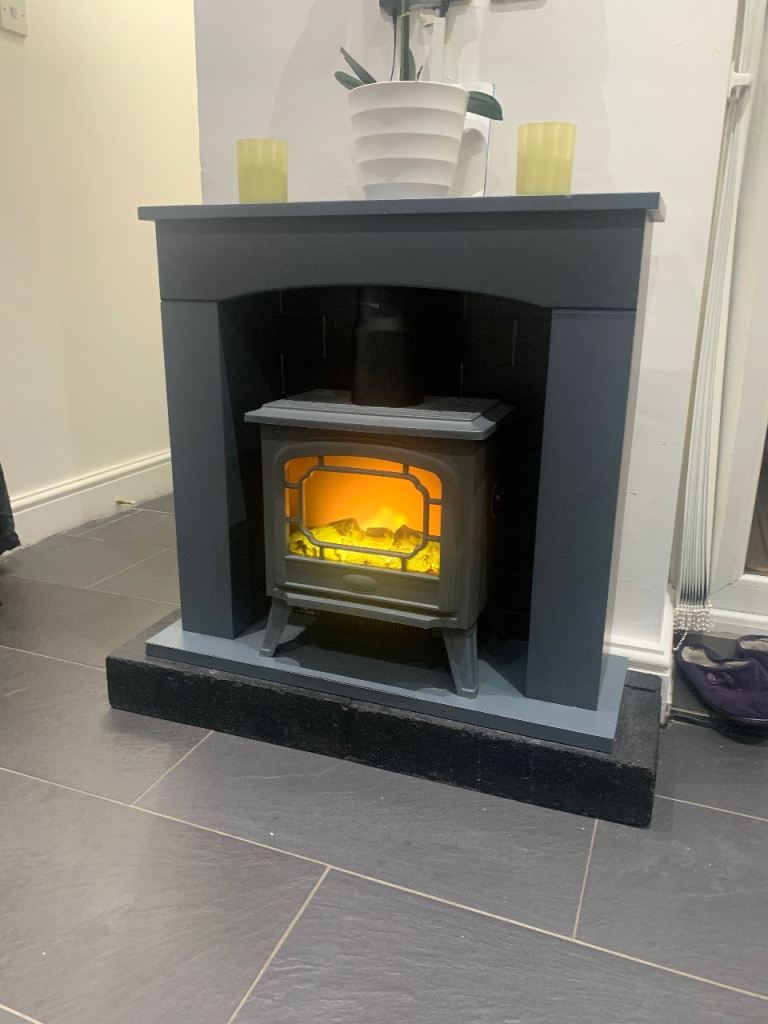 Electric fire, surround, mantel and hearth